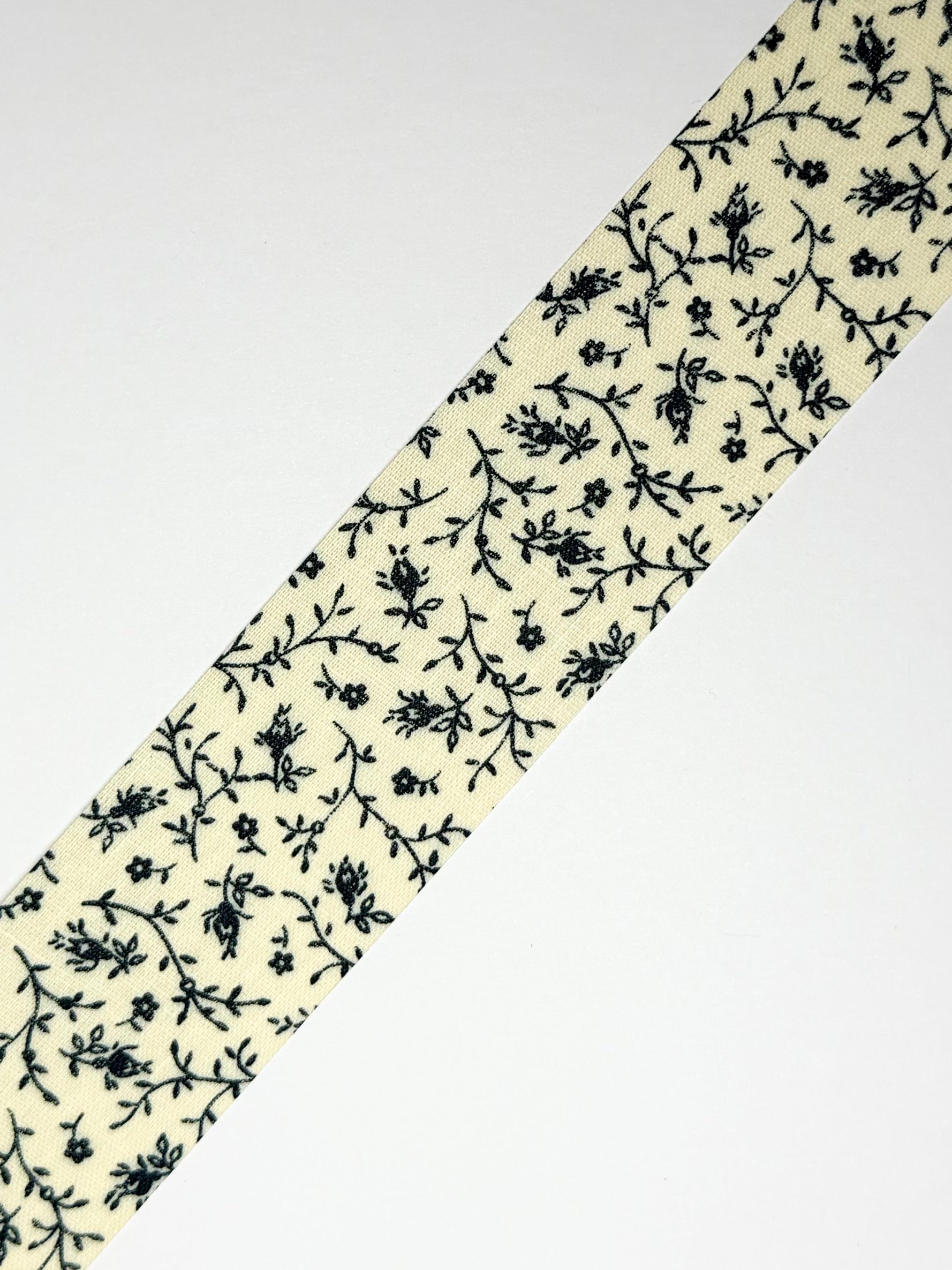 1.25 Vintage Cream w/ Black Floral